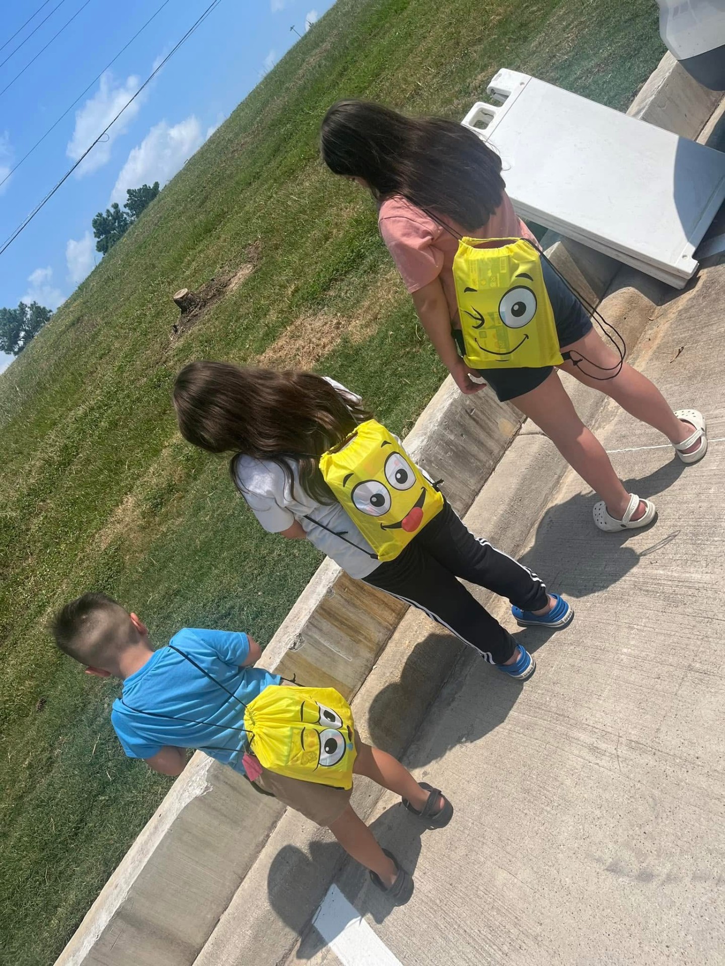 Children with backpacks