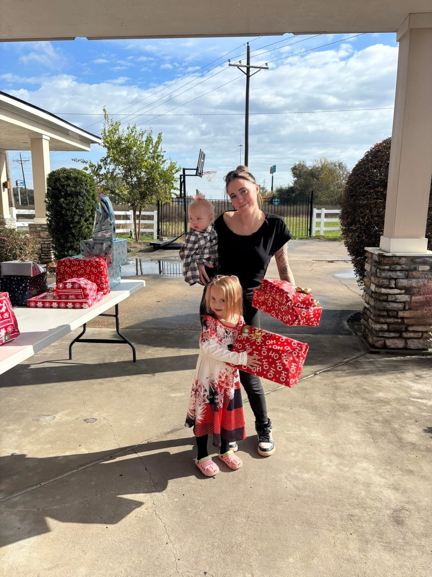 Family receiving gifts and support